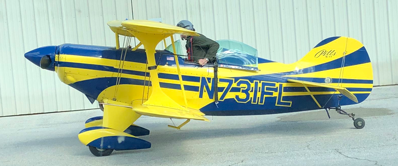 Pitts Biplane. I’m not sure how old this fellow was, but he was definitely of retirement age. He was wearing a flight suit, military-style helmet, and a parachute. I was told later he does his best to fly the wings off that plane every weekend.